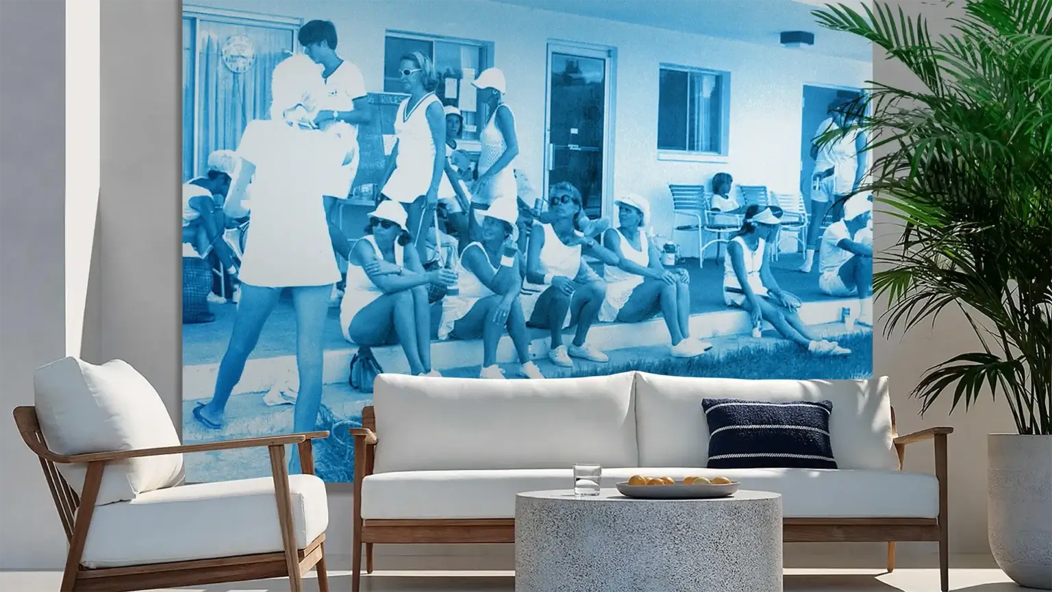 Groups of people enjoying the outdoor amenities at Bath and Racquet Residences, a luxury property in Sarasota